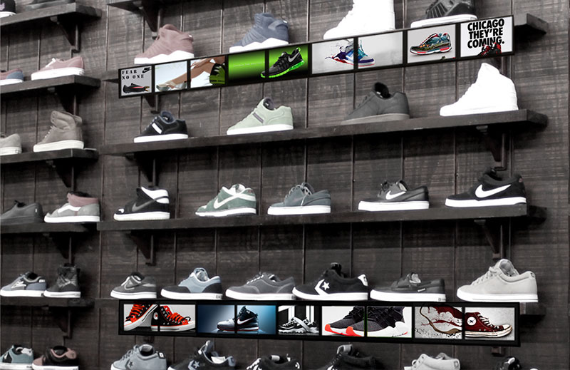 shelf edge display on shoe shelves