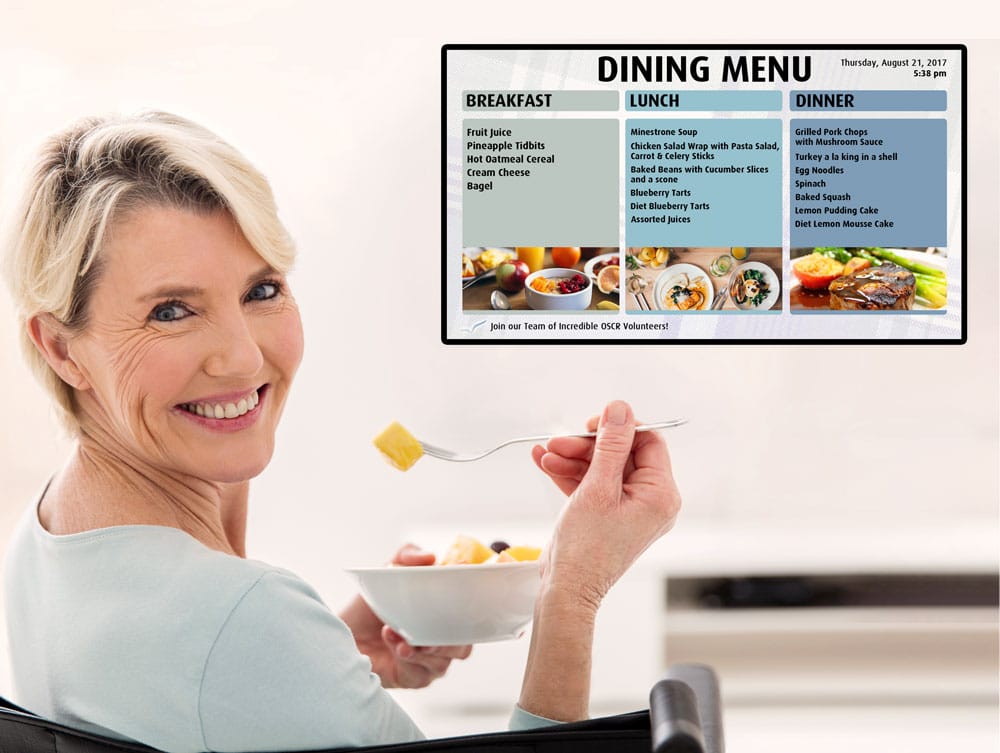 senior viewing digital menu at retirement home