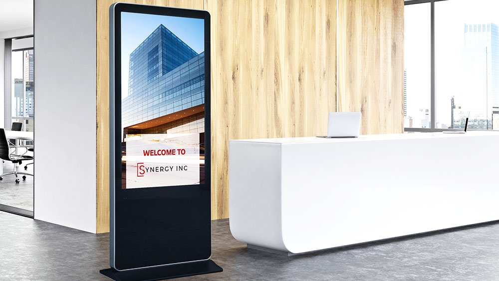 digital kiosk displaying welcome message near reception desk