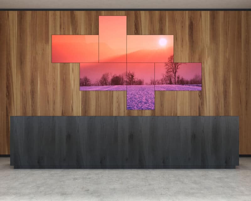 mosaic video wall above reception desk showing a beautiful landscape