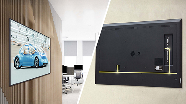 LG UH5Q display mounted close to a wall, with its rear cable routing shown